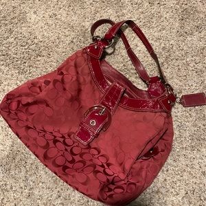 Large Coach purse. Three pockets in great condition.